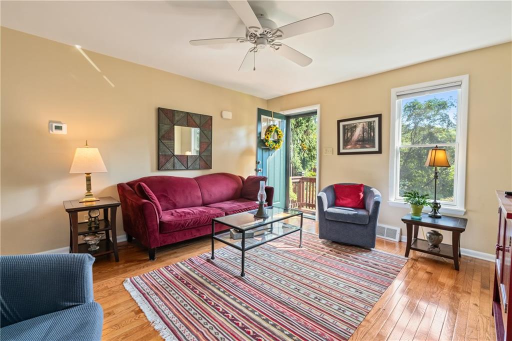 403 Filmore Road Pittsburgh, PA 15221 - Photo 19 of 35 Charming living room welcomes you in the front of the home.