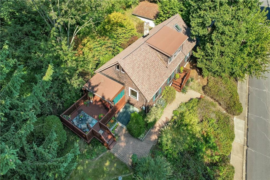Aerial view showing the deck, newer roof.