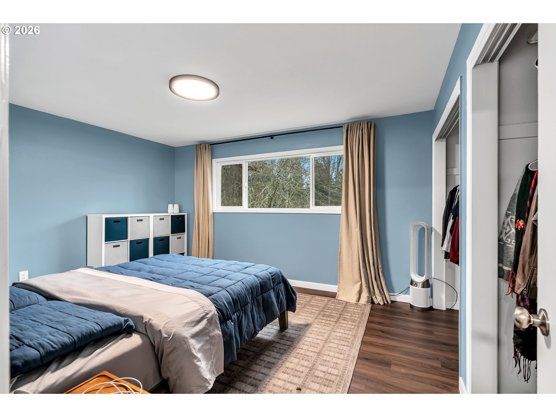 1320 Southwest 31st Street Gresham, OR 97080 - Photo 22 of 48 a bedroom with a bed and a large window