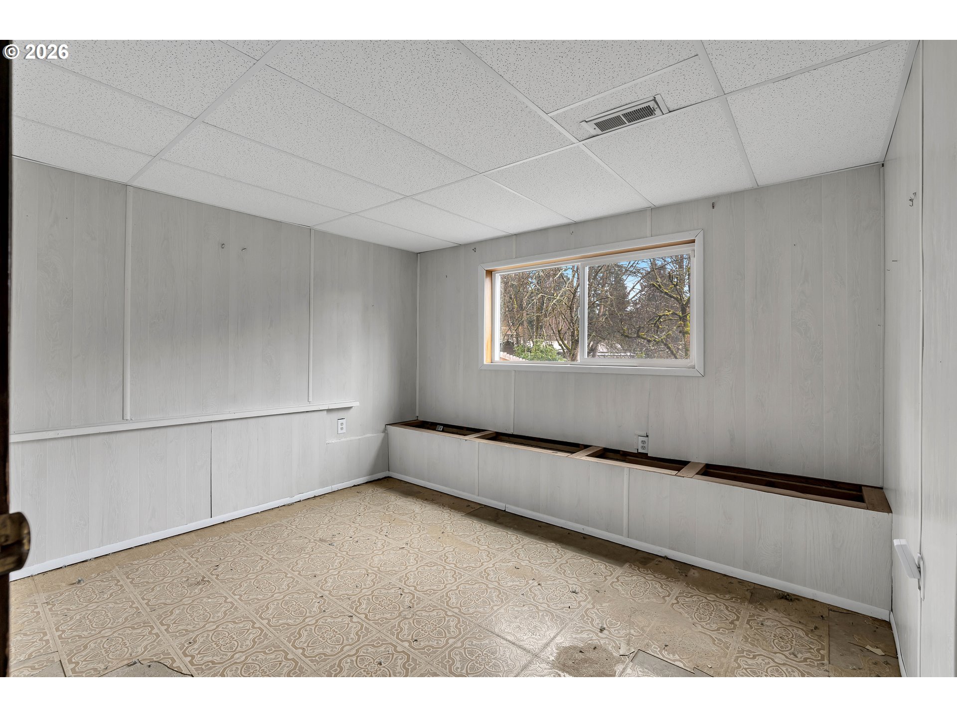 1320 Southwest 31st Street Gresham, OR 97080 - Photo 29 of 48 a view of an empty room with a window