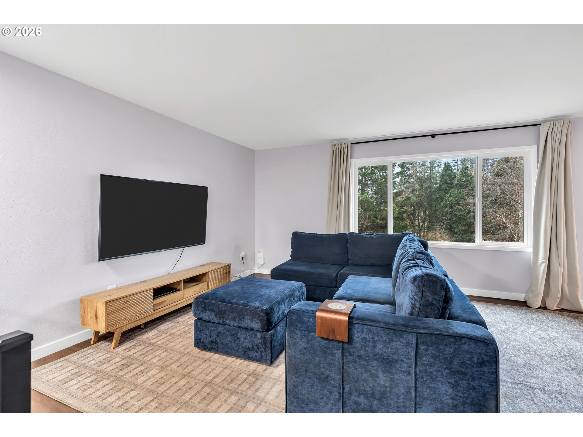 1320 Southwest 31st Street Gresham, OR 97080 - Photo 6 of 48 a living room with furniture and a flat screen tv