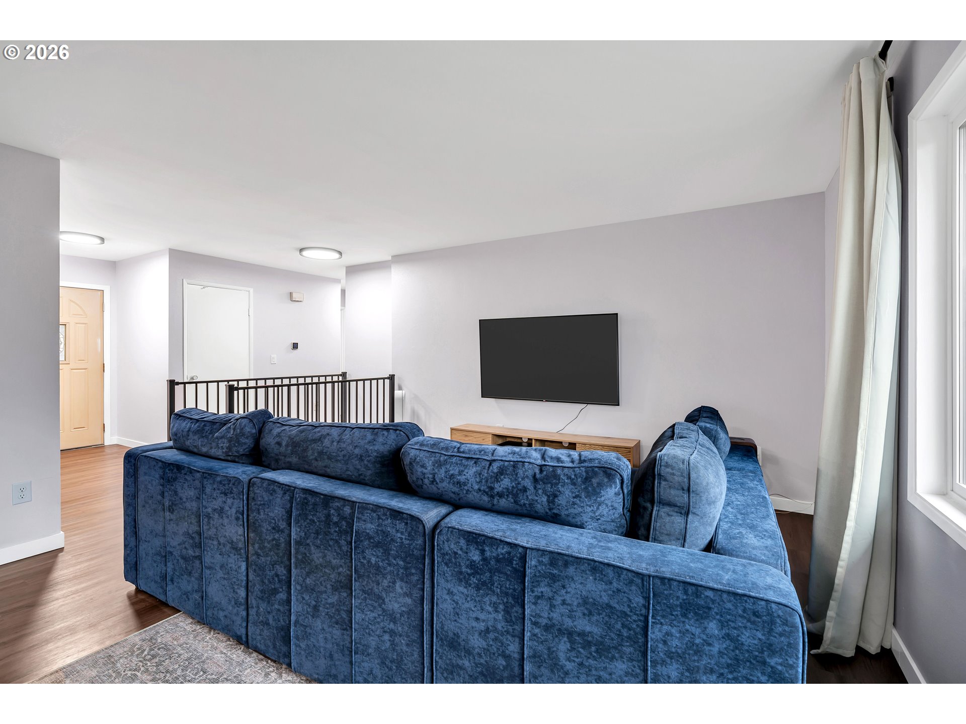 1320 Southwest 31st Street Gresham, OR 97080 - Photo 7 of 48 a living room with furniture and a flat screen tv