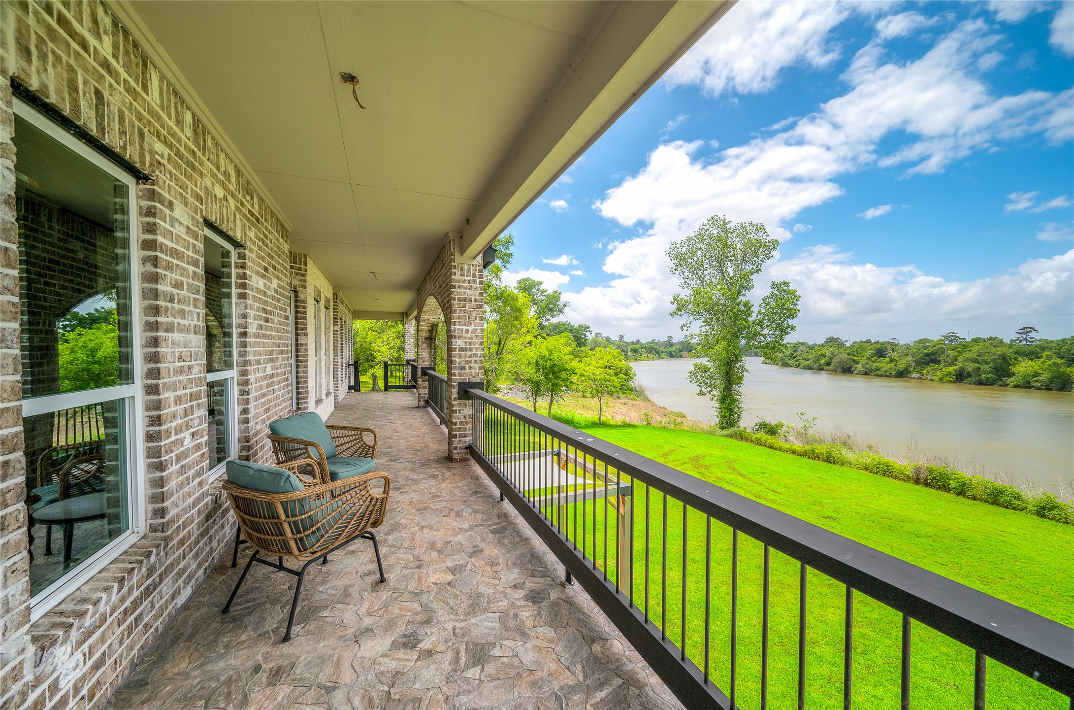 206 Elm Street Highlands, TX 77562 - Photo 15 of 50 upstairs balcony on the back of house. The sunsets are unreal here!