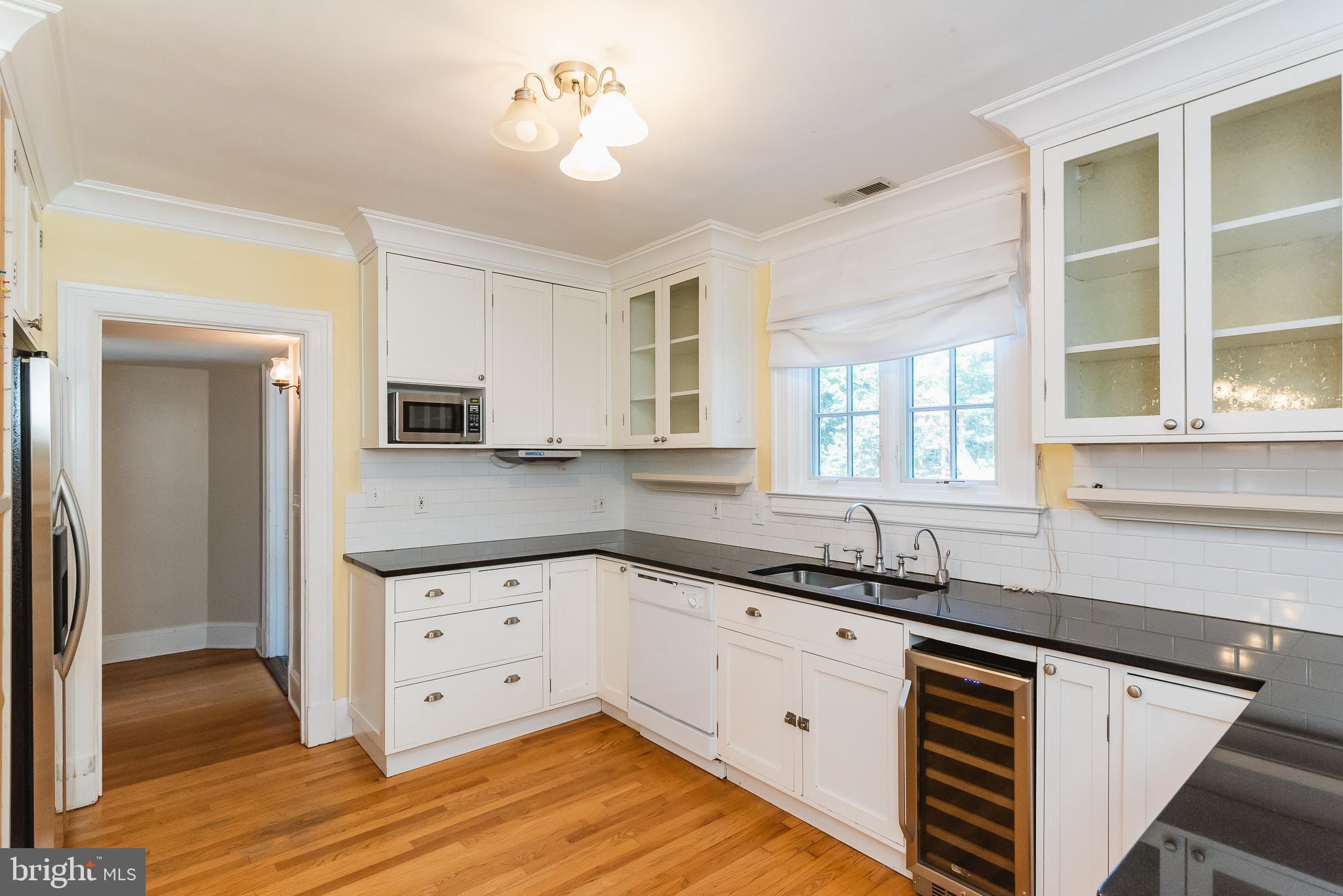 3806 Juniper Road Baltimore, MD 21218 - Photo 12 of 66 Kitchen w/wine fridge.