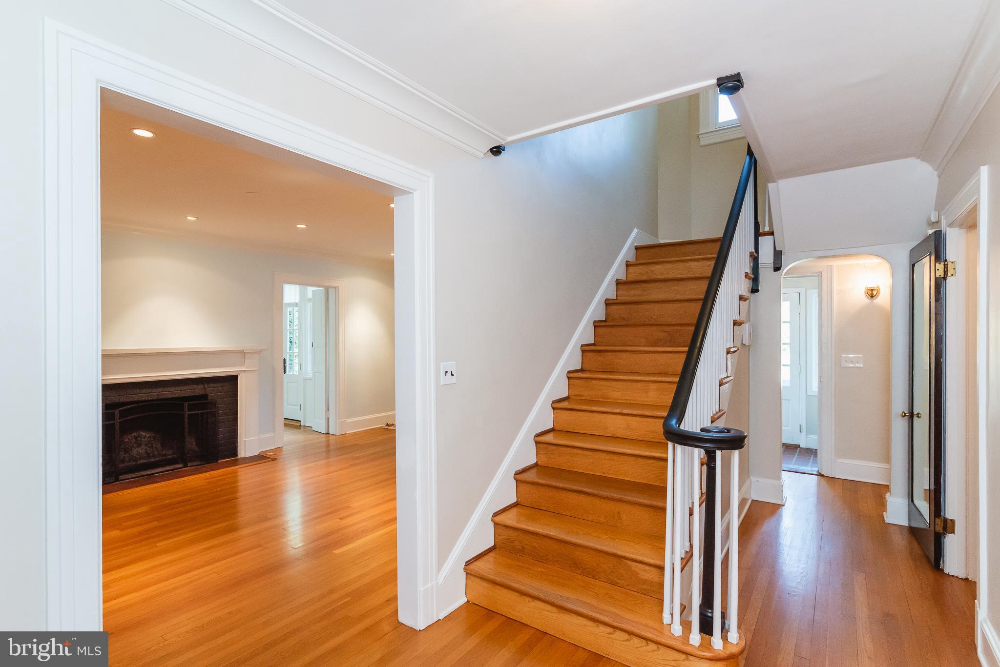 3806 Juniper Road Baltimore, MD 21218 - Photo 4 of 66 Center hall grand staircase.