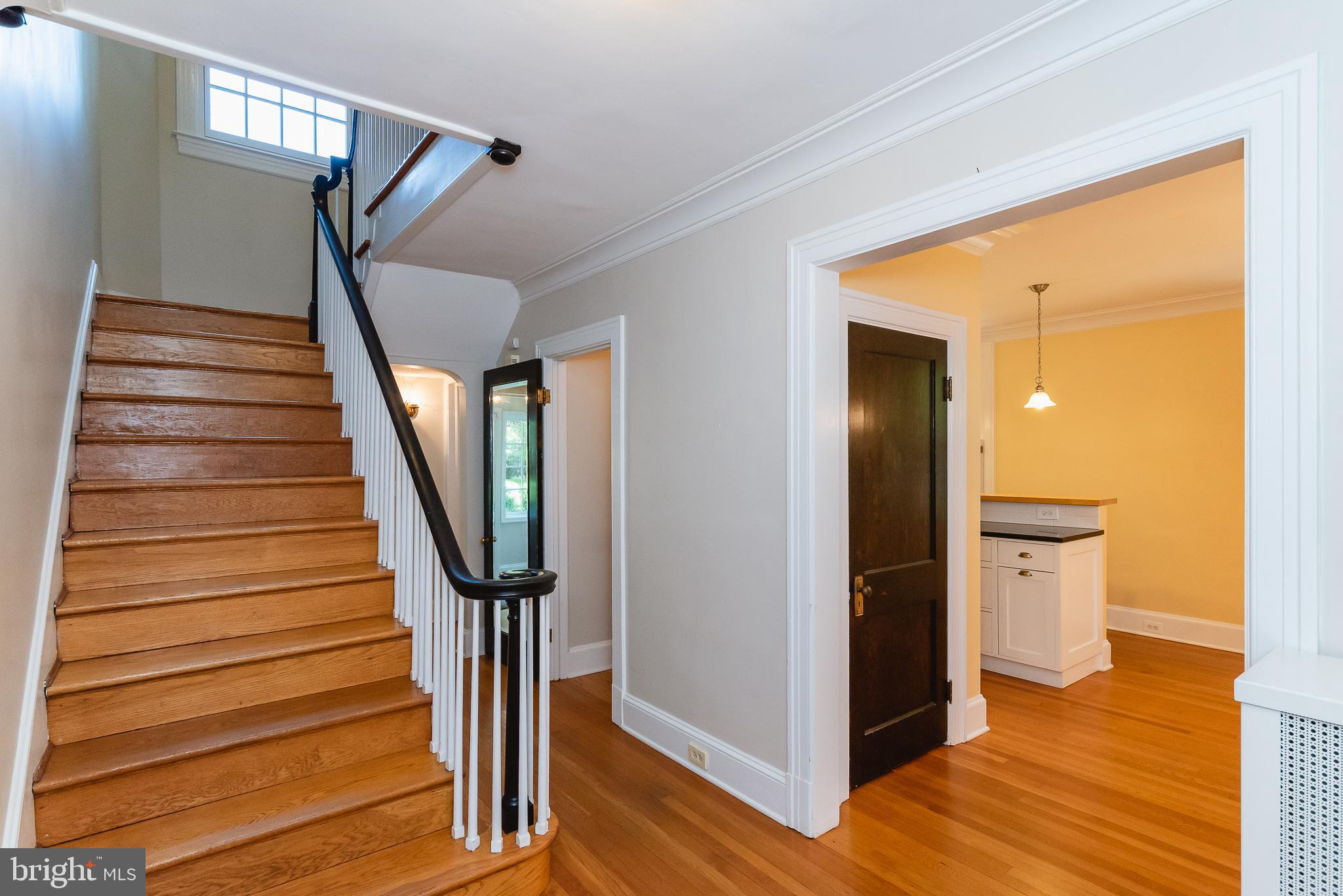 3806 Juniper Road Baltimore, MD 21218 - Photo 5 of 66 Center hall grand staircase.