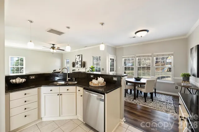 a bathroom with a toilet a sink and a mirror
