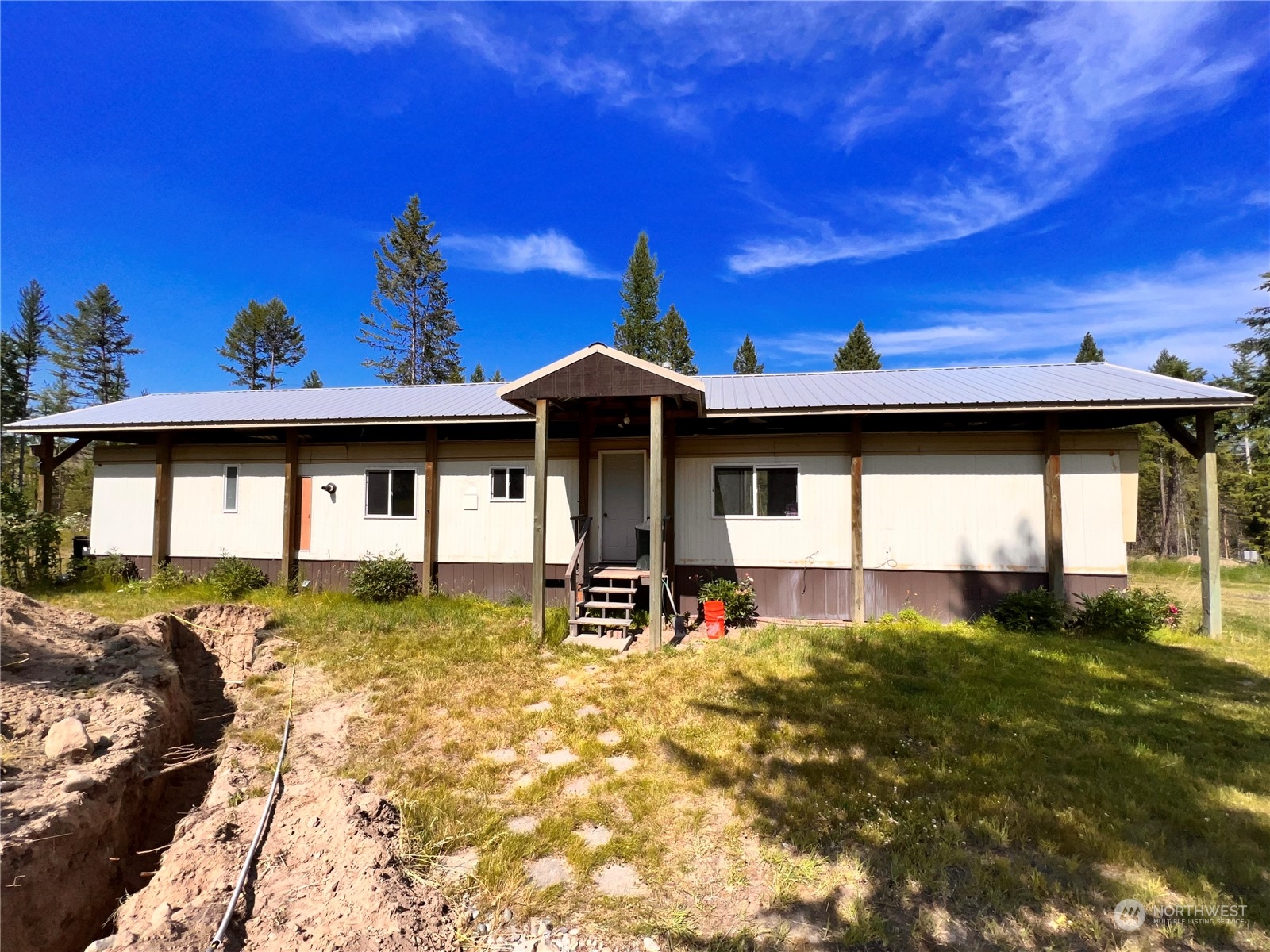 44 Vista Drive Republic, WA 99166 - Photo 19 of 28 a front view of a house with a yard