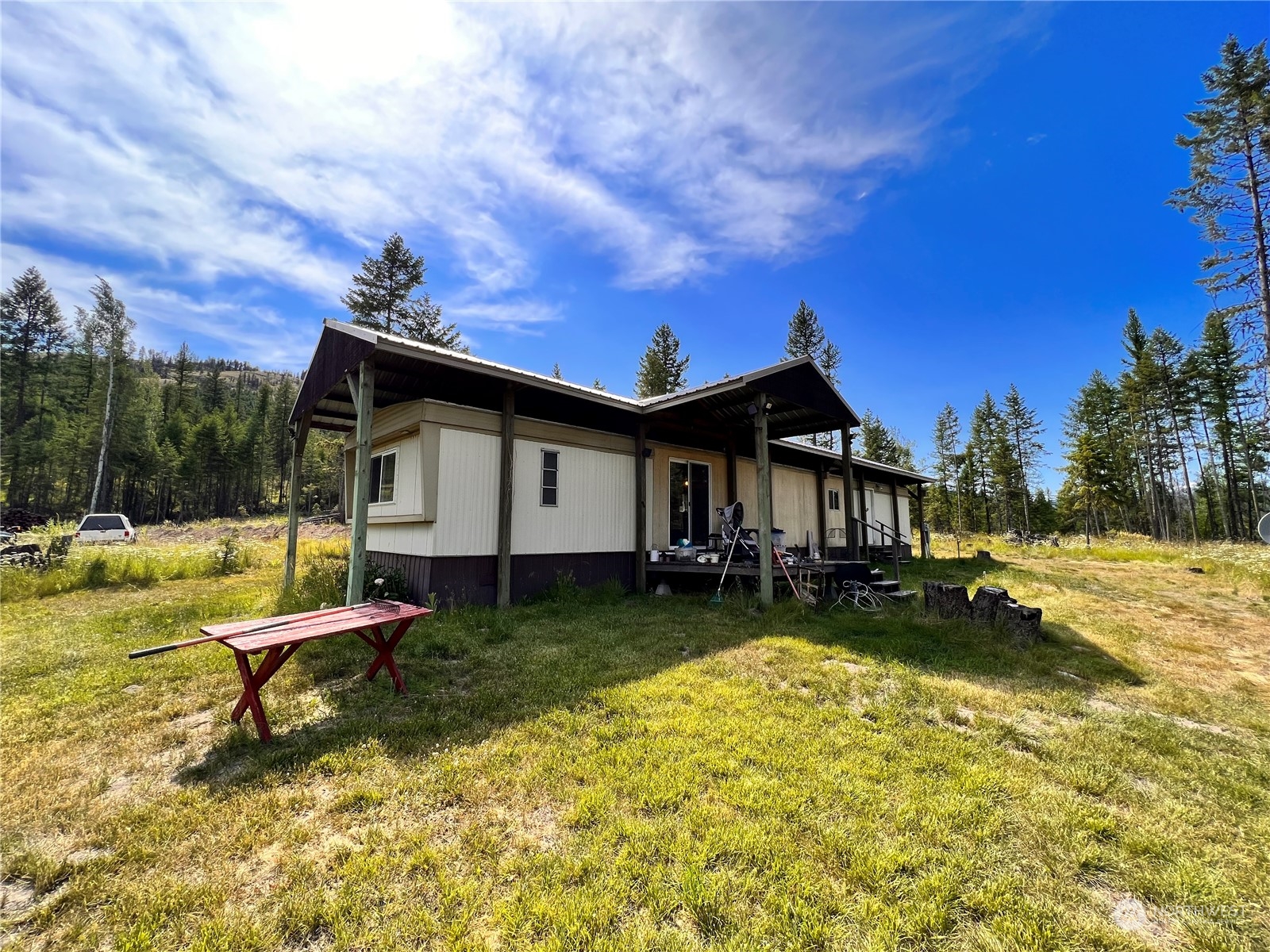 44 Vista Drive Republic, WA 99166 - Photo 24 of 28 a view of a house with swimming pool and sitting area