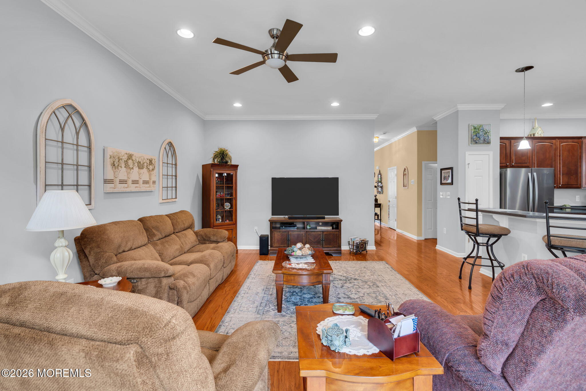 56 Pond View Circle Barnegat, NJ 08005 - Photo 16 of 32 a living room with furniture kitchen view and a flat screen tv