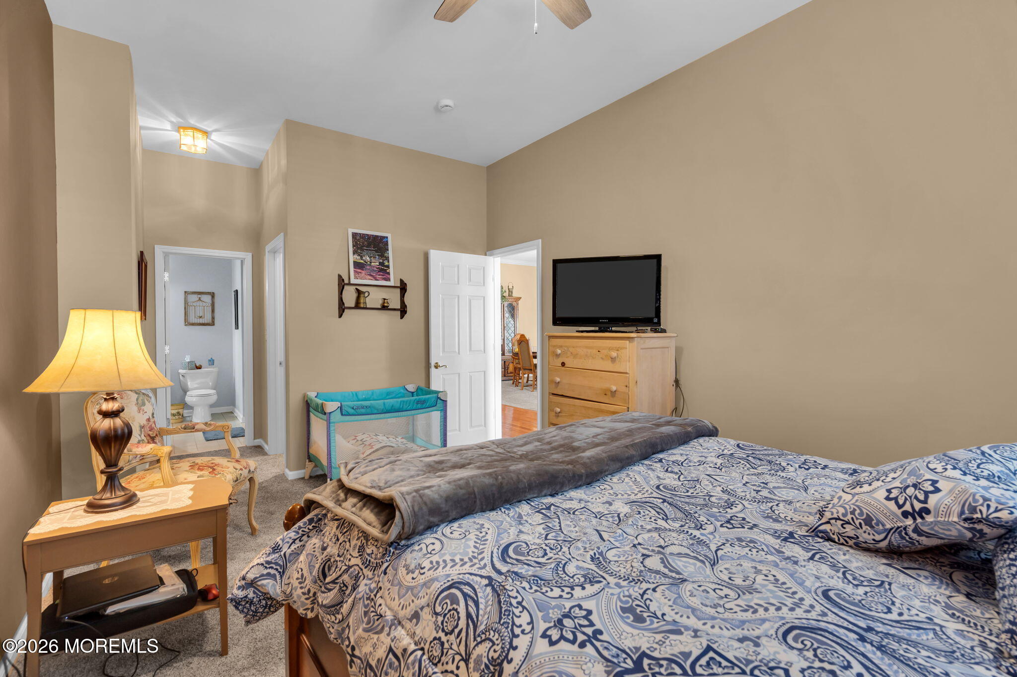 56 Pond View Circle Barnegat, NJ 08005 - Photo 21 of 32 a bedroom with a bed and a flat screen tv
