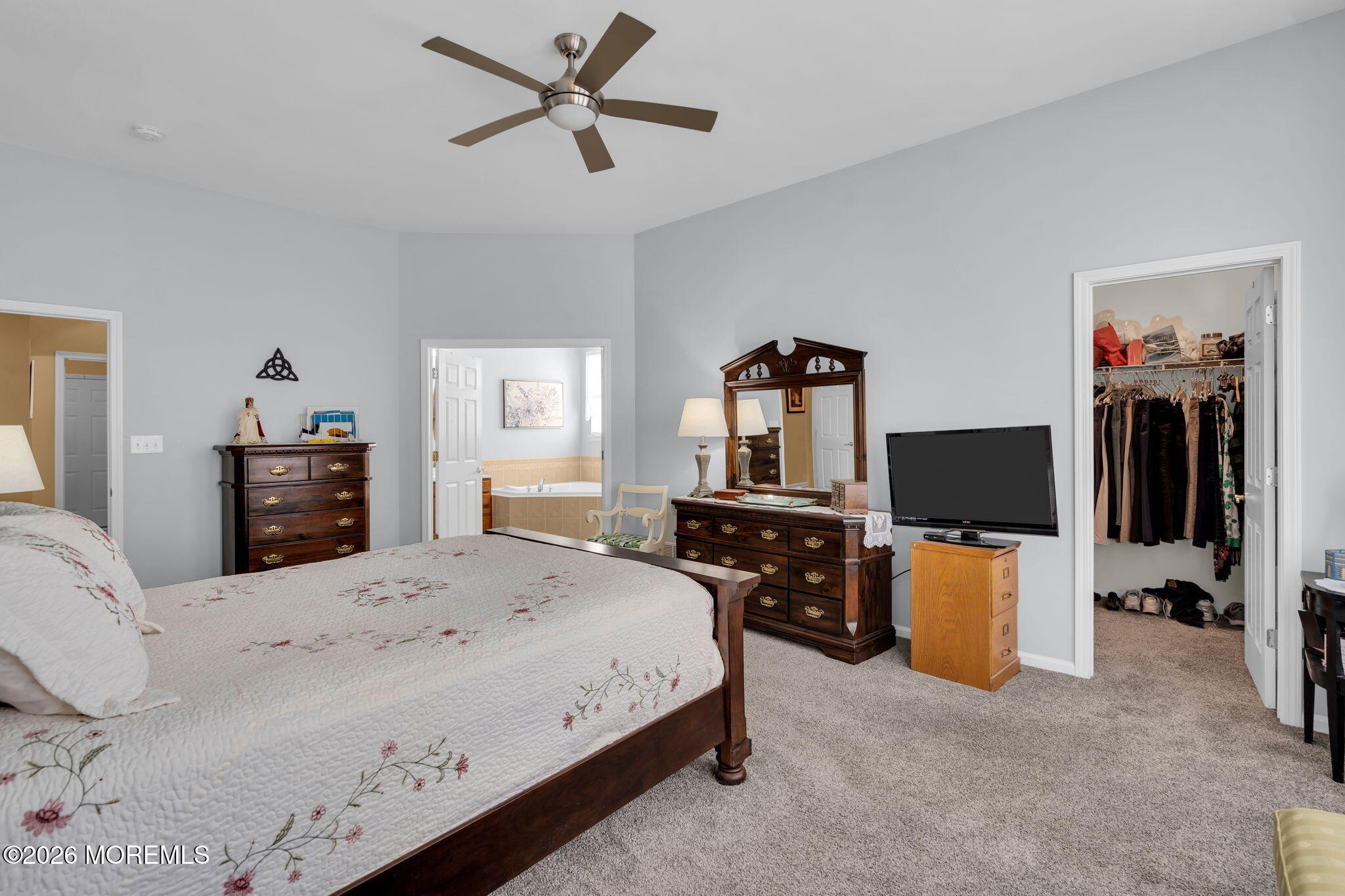 56 Pond View Circle Barnegat, NJ 08005 - Photo 23 of 32 a bedroom with a bed and a flat screen tv