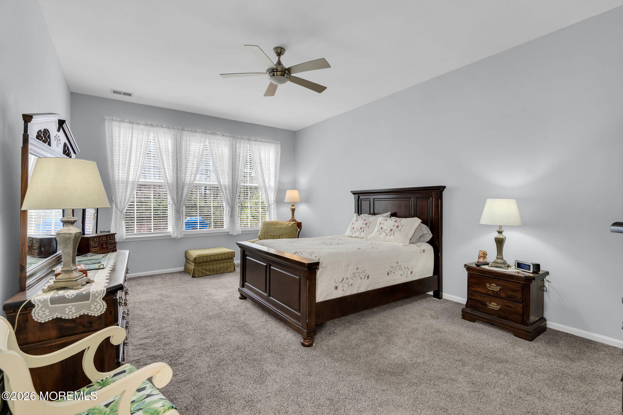 56 Pond View Circle Barnegat, NJ 08005 - Photo 24 of 32 a spacious bedroom with a bed and wooden floor