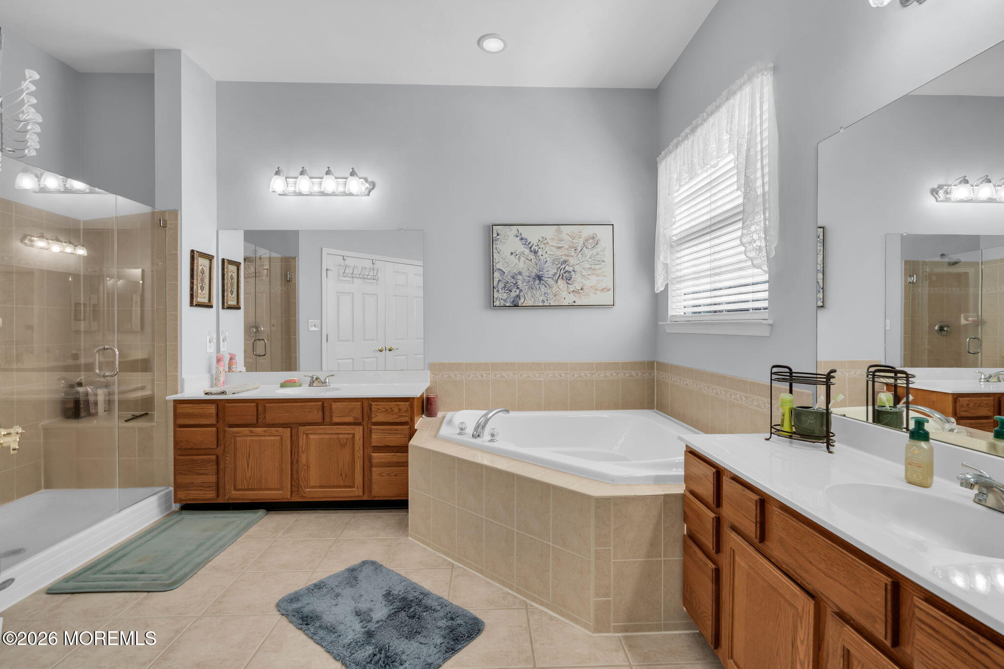 56 Pond View Circle Barnegat, NJ 08005 - Photo 25 of 32 a bathroom with a tub double vanity sink and window