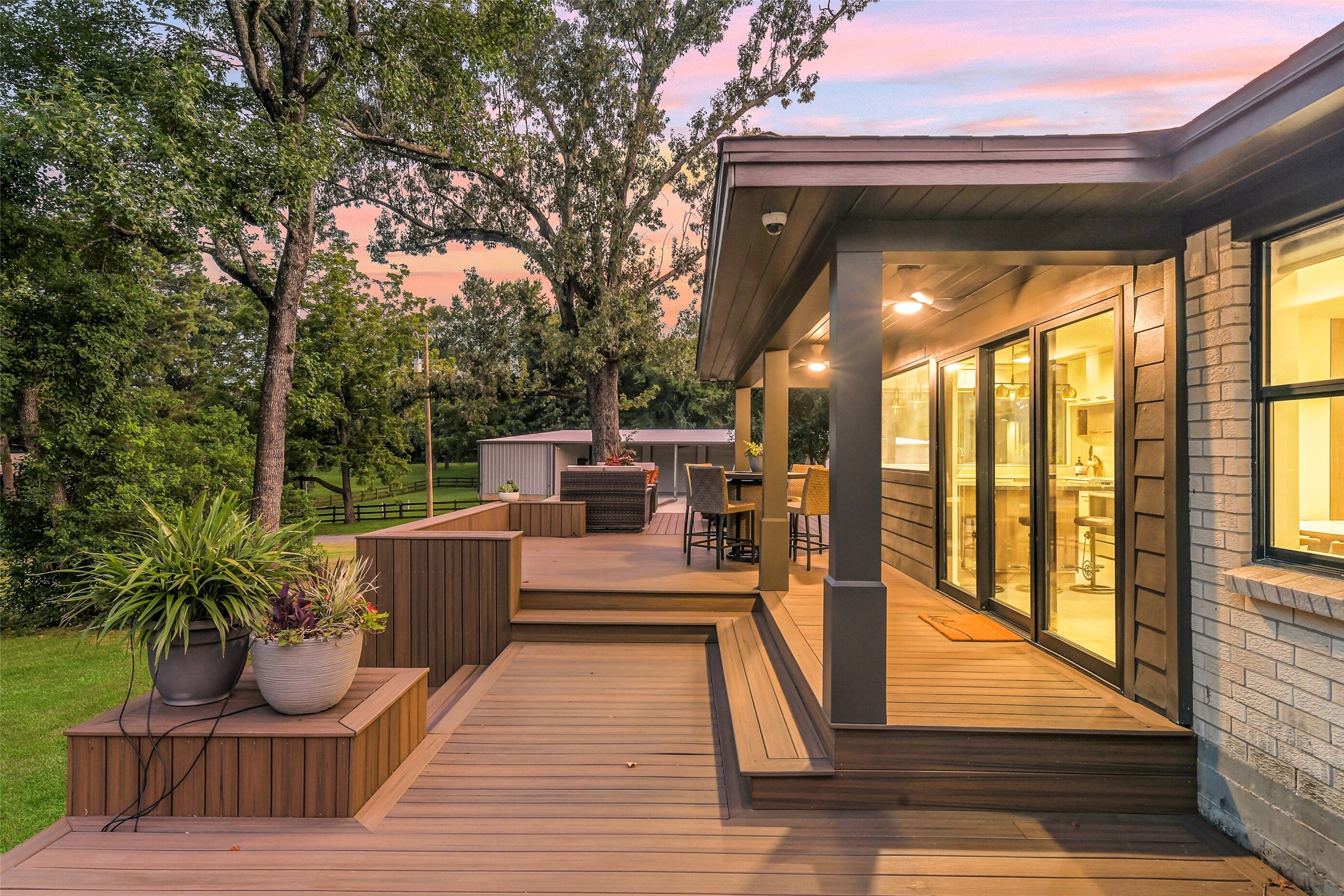 0 Camilla Lake Road Coldspring, TX 77331 - Photo 15 of 50 Brick House: More than 1,000 sq ft low maintenance Trex decking spans the outdoor living area from the kitchen, complemented by covered spaces, exterior lighting and seamless access from the home! Just gorgeous!