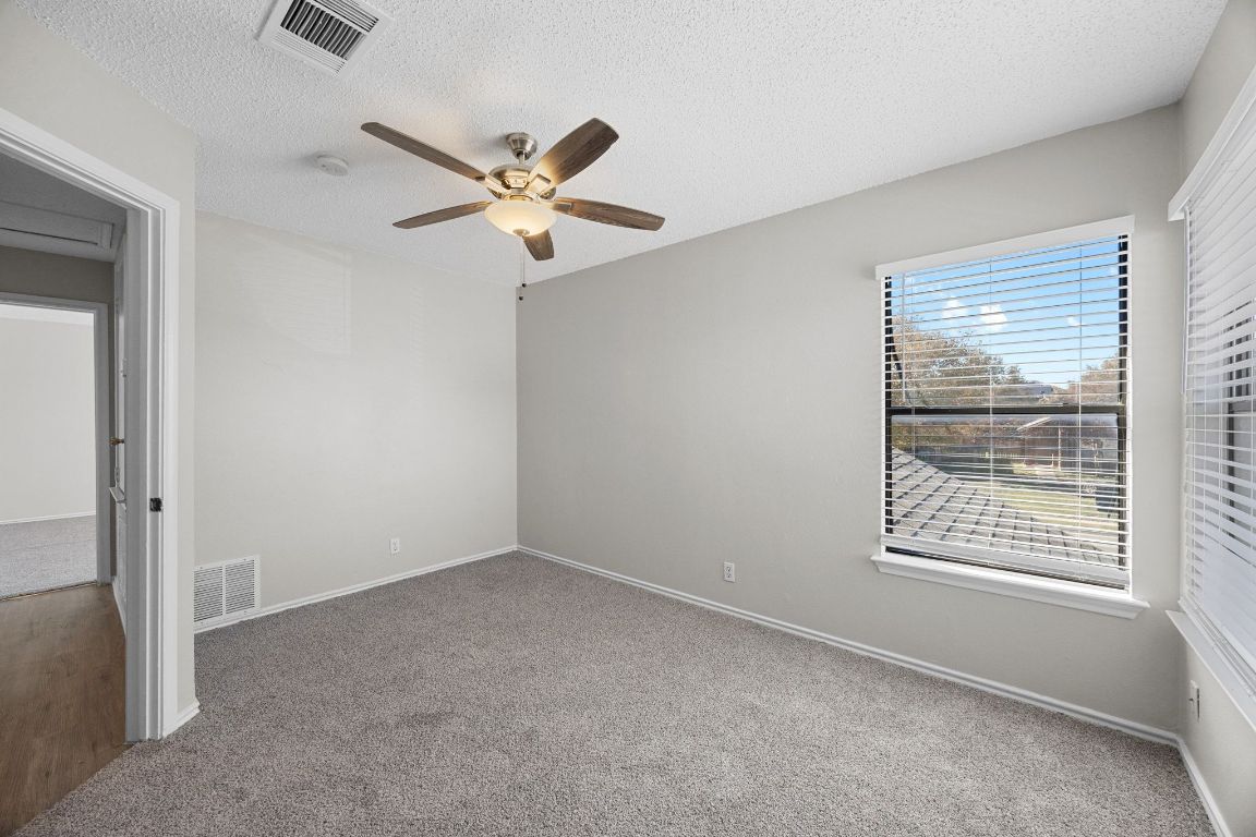 1326 Lakeside Loop Round Rock, TX 78665 - Photo 23 of 29 a view of an empty room with a window