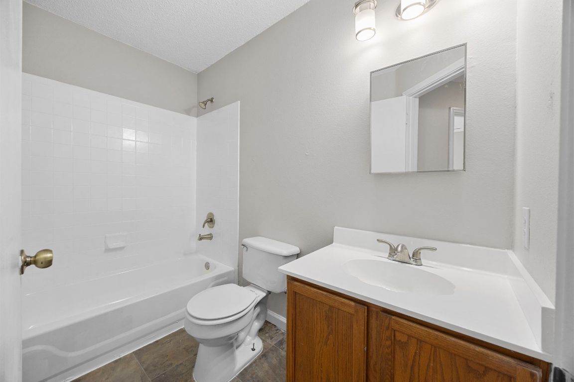 1326 Lakeside Loop Round Rock, TX 78665 - Photo 25 of 29 a bathroom with a sink toilet and shower