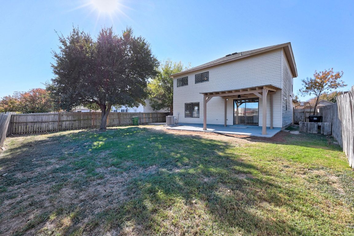 1326 Lakeside Loop Round Rock, TX 78665 - Photo 27 of 29 a swimming pool with outdoor seating and yard