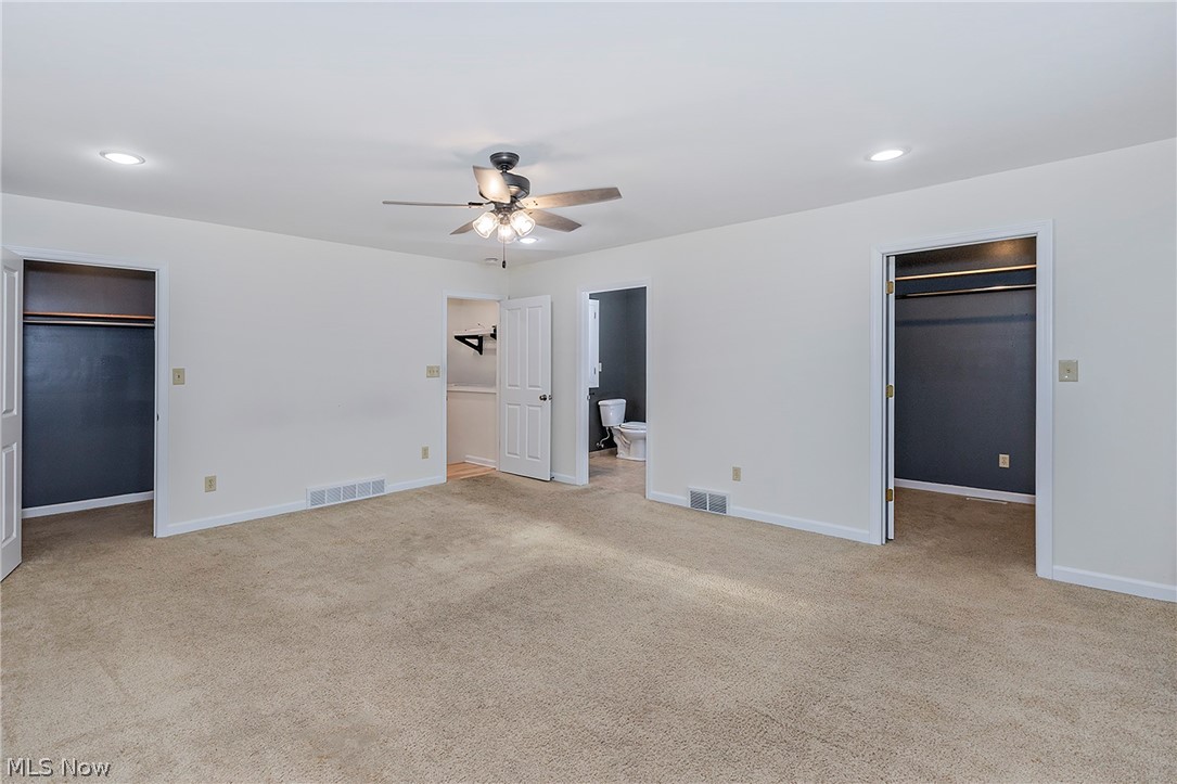 917 Brunswick Road Cleveland Heights, OH 44112 - Photo 19 of 42 Stunning primary suite with recessed lighting, ceiling fan, two walkin closets and full bat.
