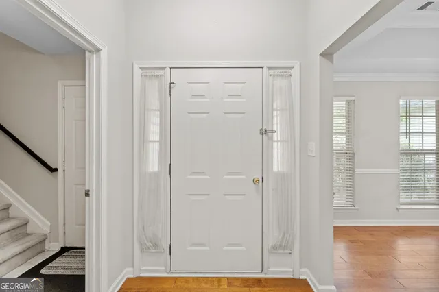 a view of bathroom with shower and window