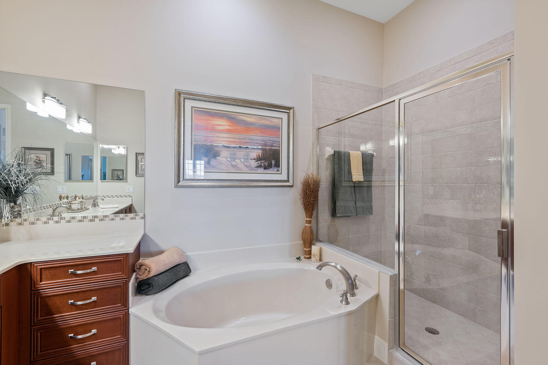 9263 Museo Circle, Unit 202 Naples, FL 34114 - Photo 12 of 45 a bathroom with a bathtub and a shower