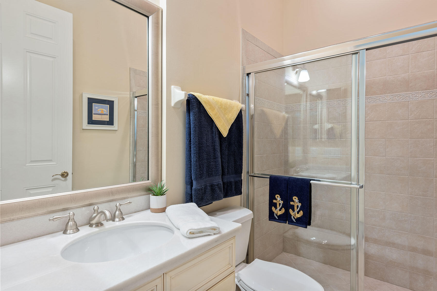 9263 Museo Circle, Unit 202 Naples, FL 34114 - Photo 14 of 45 a bathroom with a sink toilet and shower