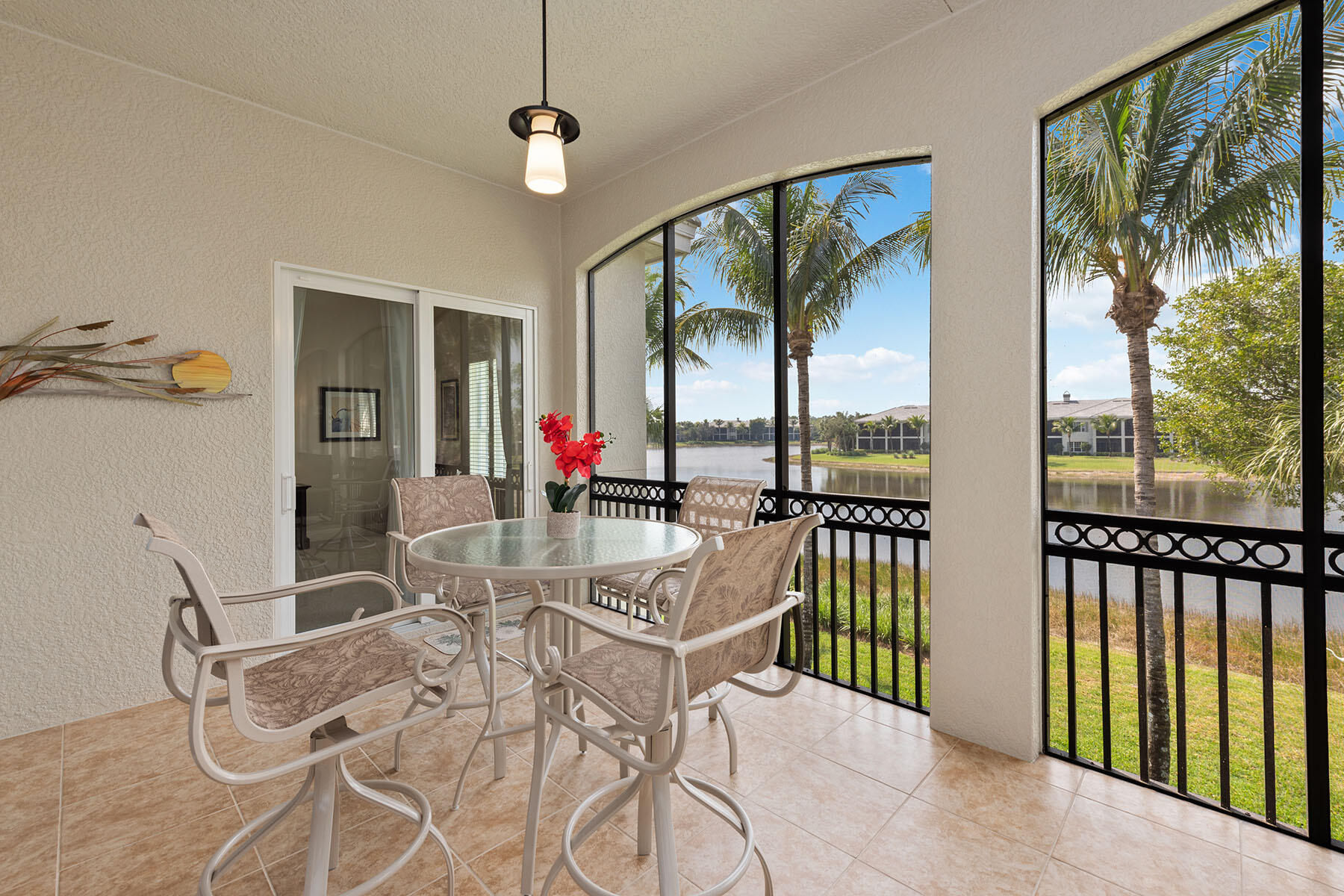 9263 Museo Circle, Unit 202 Naples, FL 34114 - Photo 18 of 45 a view of a dining room with furniture window and outside view