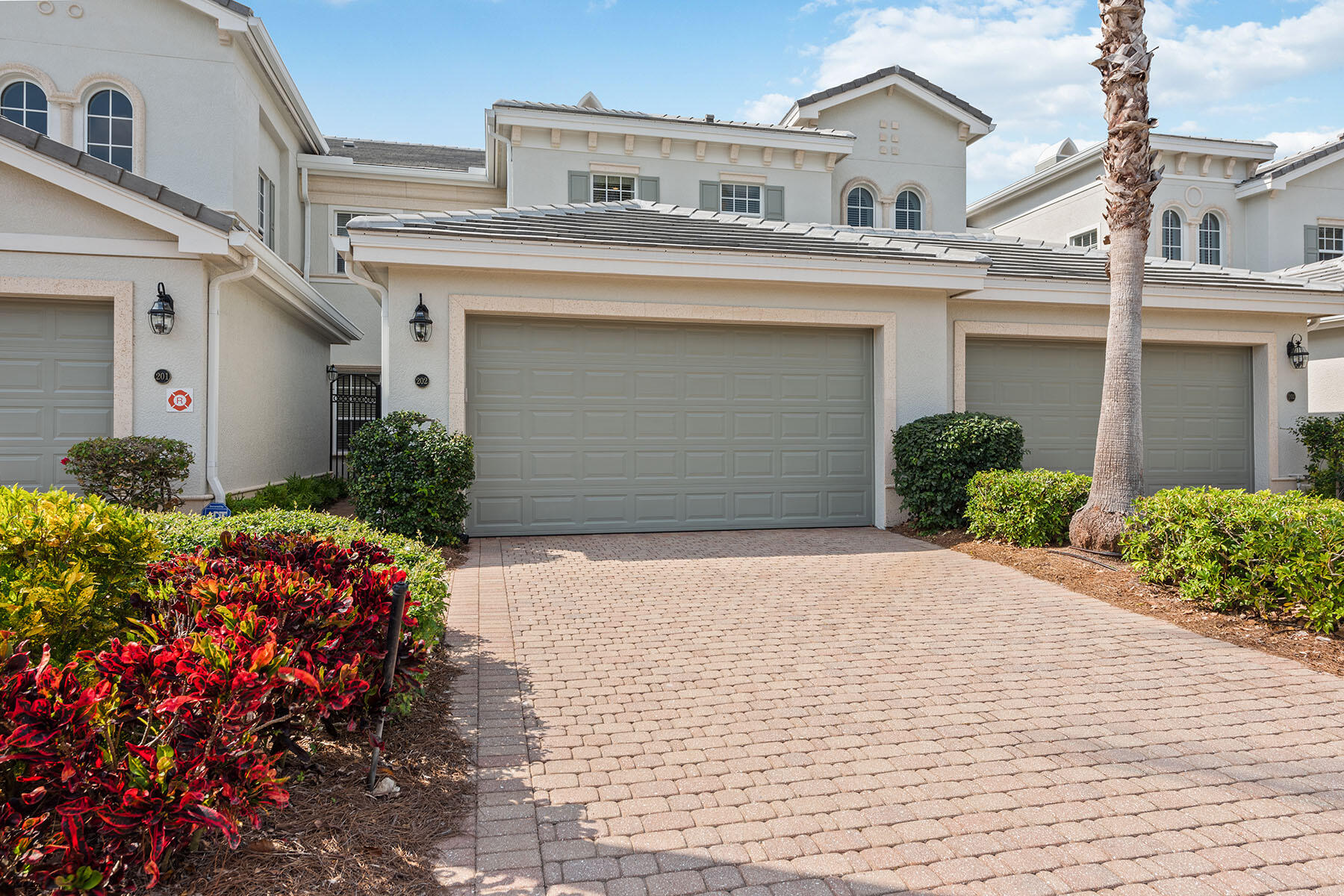 9263 Museo Circle, Unit 202 Naples, FL 34114 - Photo 21 of 45 a front view of a house
