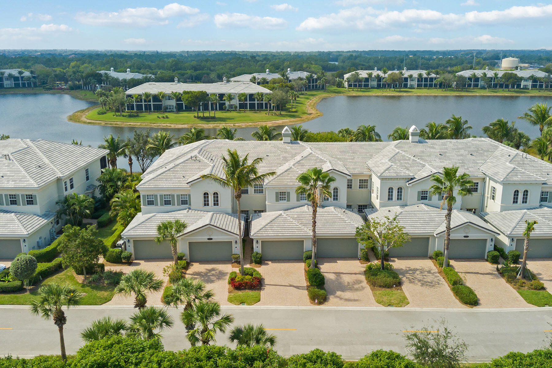 9263 Museo Circle, Unit 202 Naples, FL 34114 - Photo 23 of 45 aerial view of a house with outdoor space lake view and boat