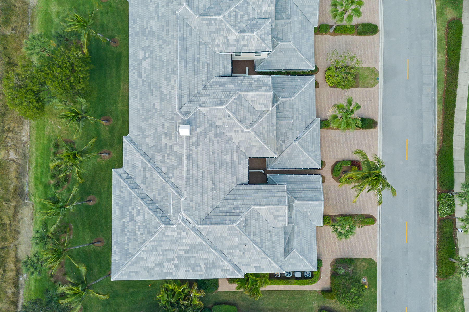 9263 Museo Circle, Unit 202 Naples, FL 34114 - Photo 25 of 45 an aerial view of a house with a garden
