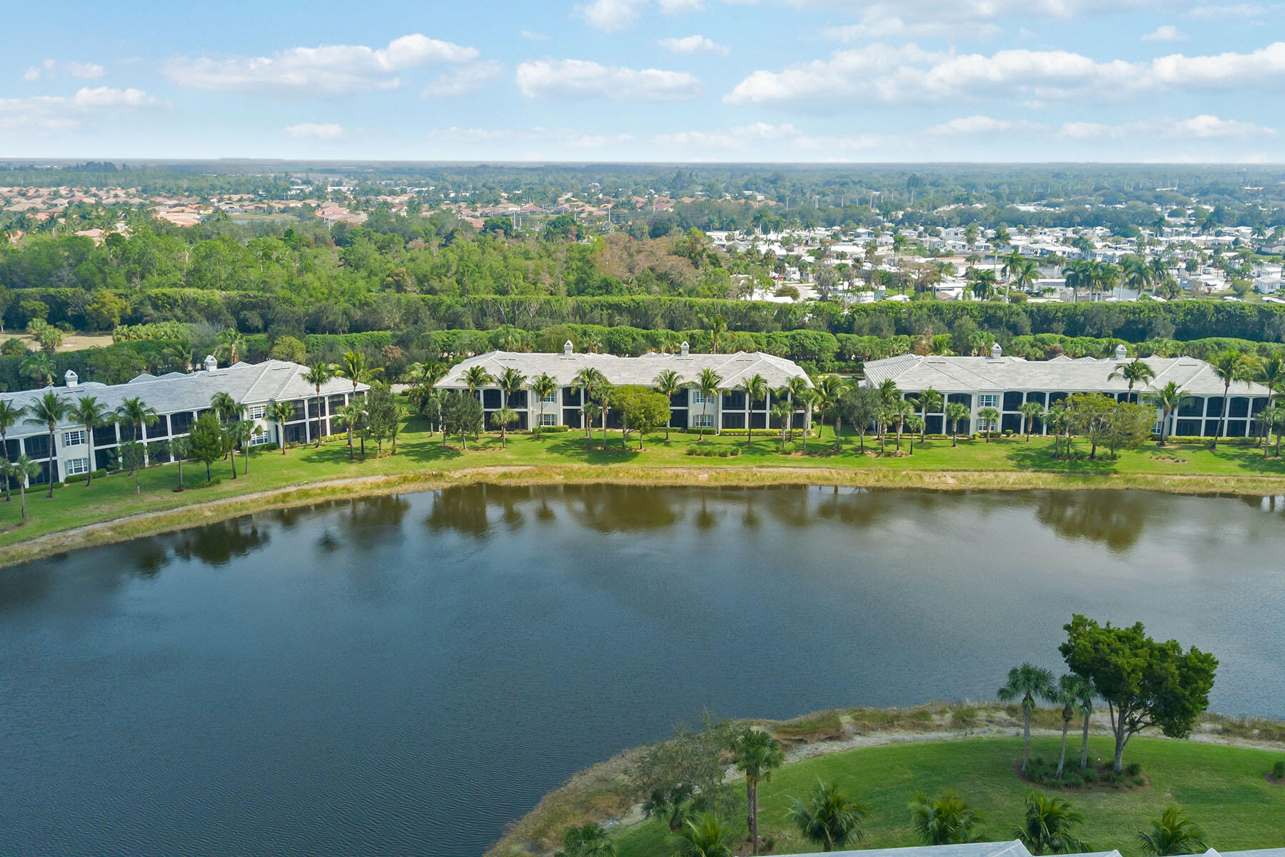 9263 Museo Circle, Unit 202 Naples, FL 34114 - Photo 26 of 45 a view of a city with lake view
