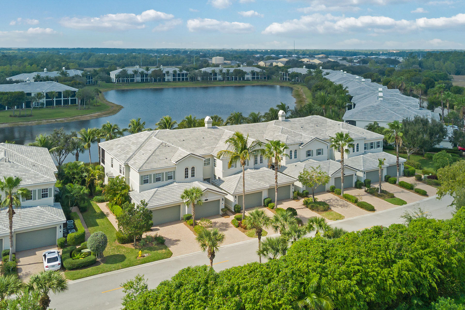 9263 Museo Circle, Unit 202 Naples, FL 34114 - Photo 29 of 45 an aerial view of residential houses with outdoor space and river