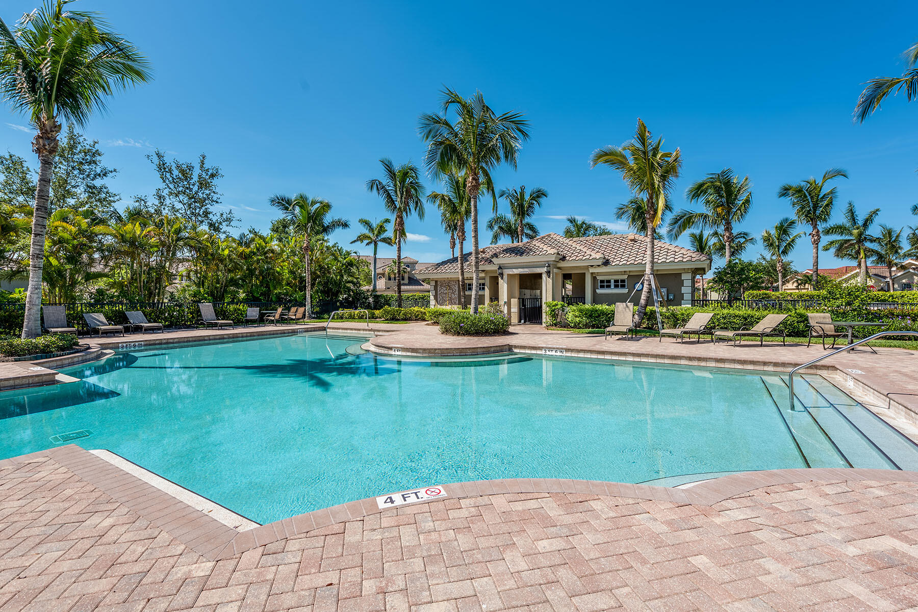9263 Museo Circle, Unit 202 Naples, FL 34114 - Photo 37 of 45 a view of a house with a yard