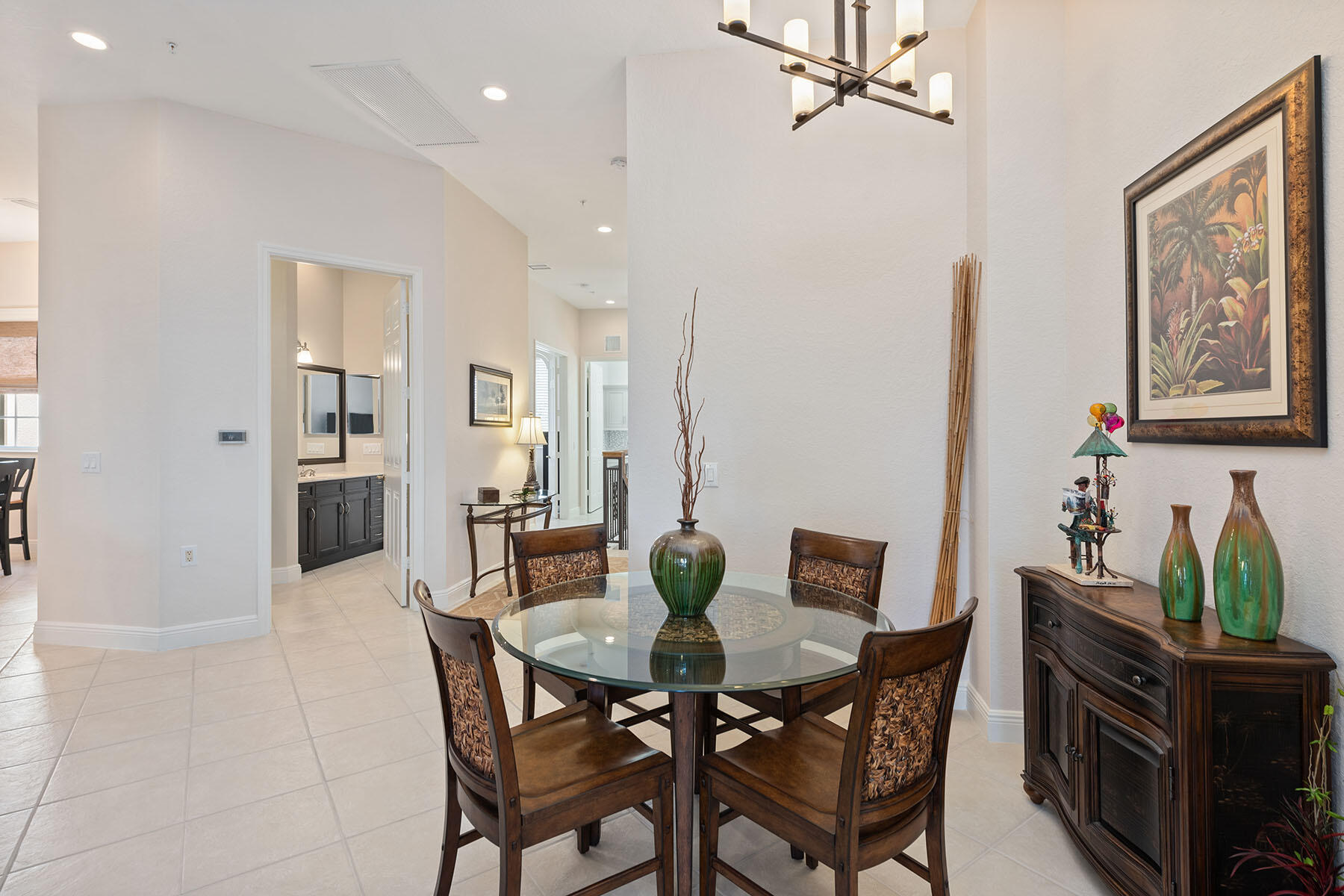 9263 Museo Circle, Unit 202 Naples, FL 34114 - Photo 8 of 45 a view of a dining room with furniture
