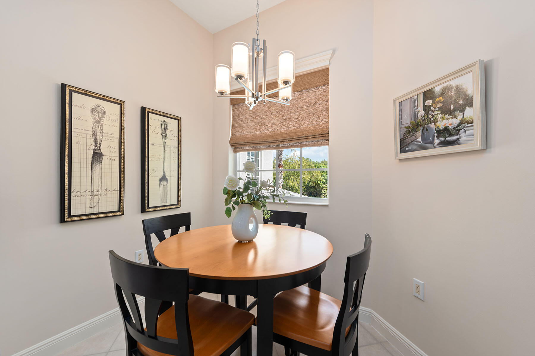 9263 Museo Circle, Unit 202 Naples, FL 34114 - Photo 9 of 45 a view of a dining room with furniture and window