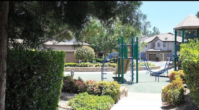 8692 East 9th Street, Unit 56 Rancho Cucamonga, CA 91730 - Photo 30 of 34 a view of a house with garden and sitting area