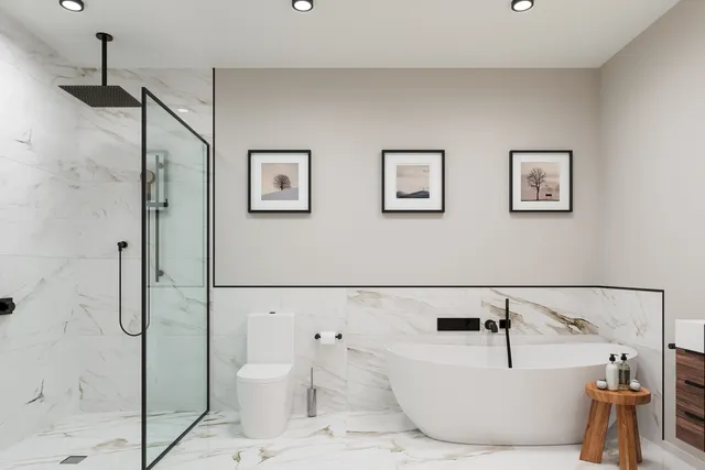 a bathroom with a bathtub and a shower