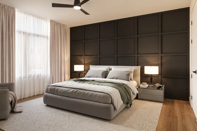 a bedroom with a bed and a window