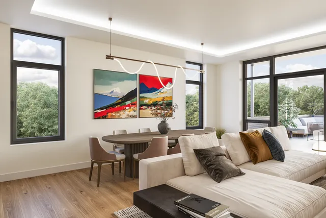 a living room with furniture and a window