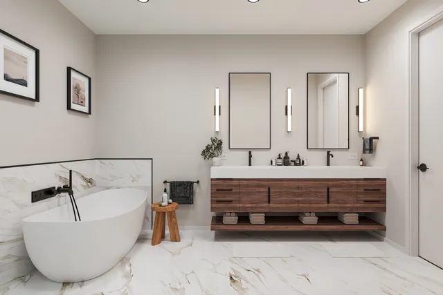 a bathroom with a bathtub a sink and mirror