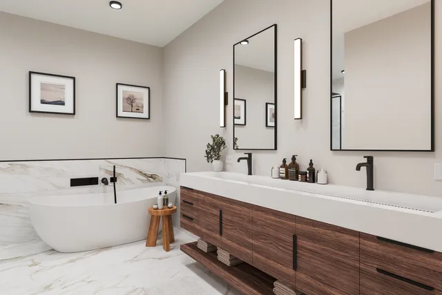 a bathroom with a double vanity sink tub and a mirror