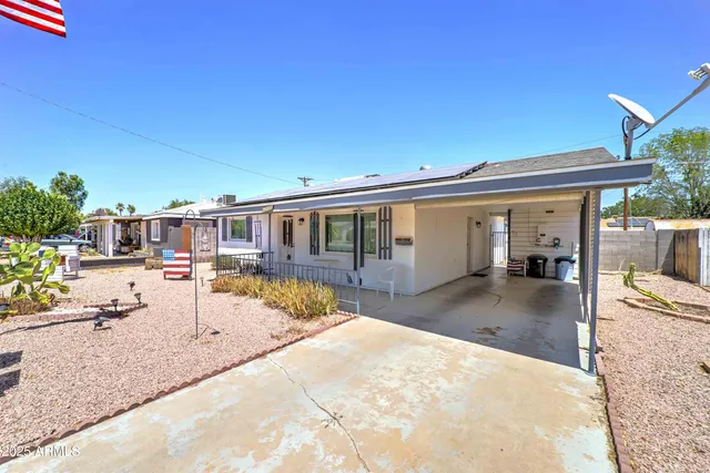 front view of a house with a patio