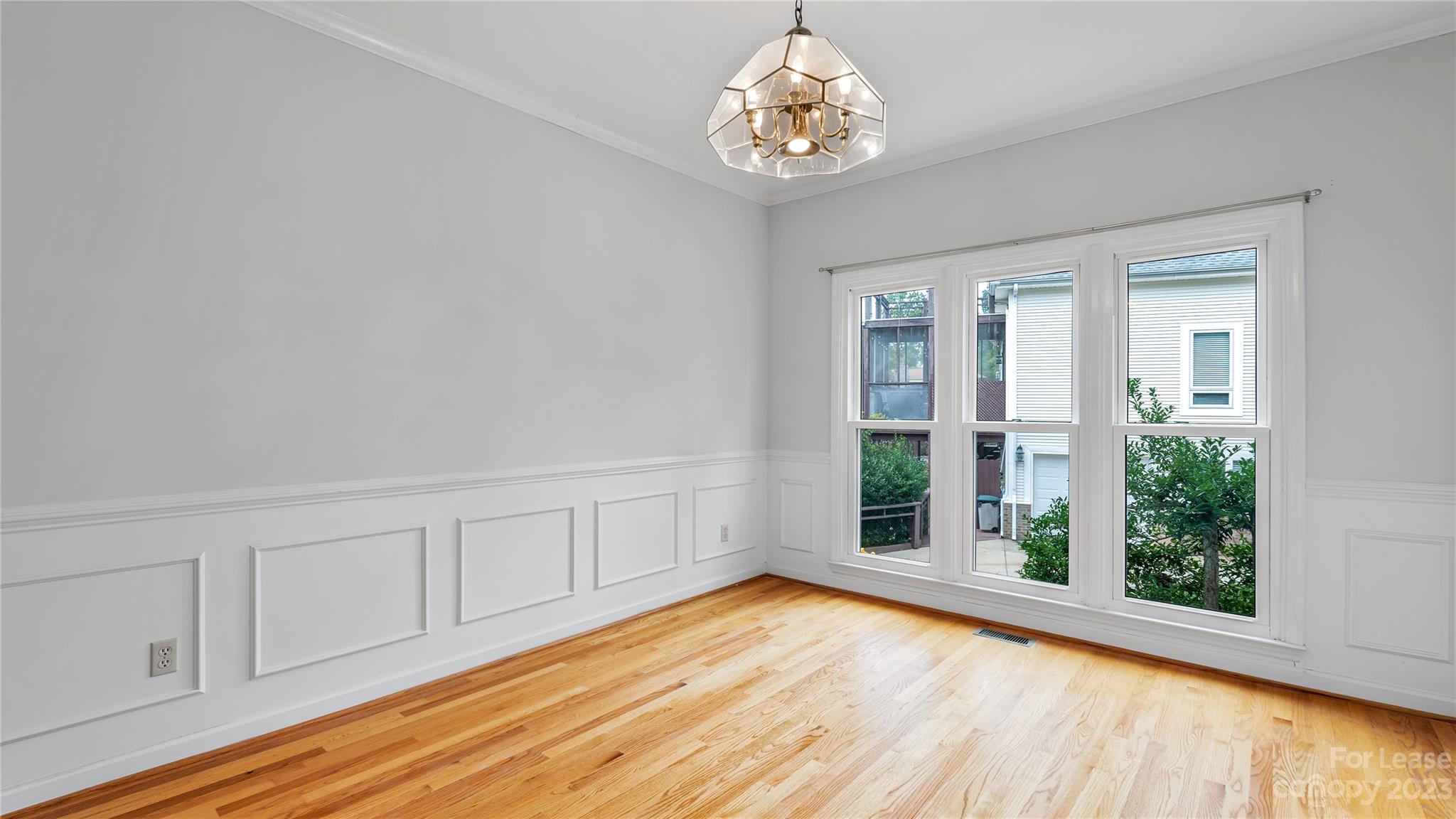 29025 Beaver Run Tega Cay, SC 29708 - Photo 13 of 40 wooden floor in an empty room with a window