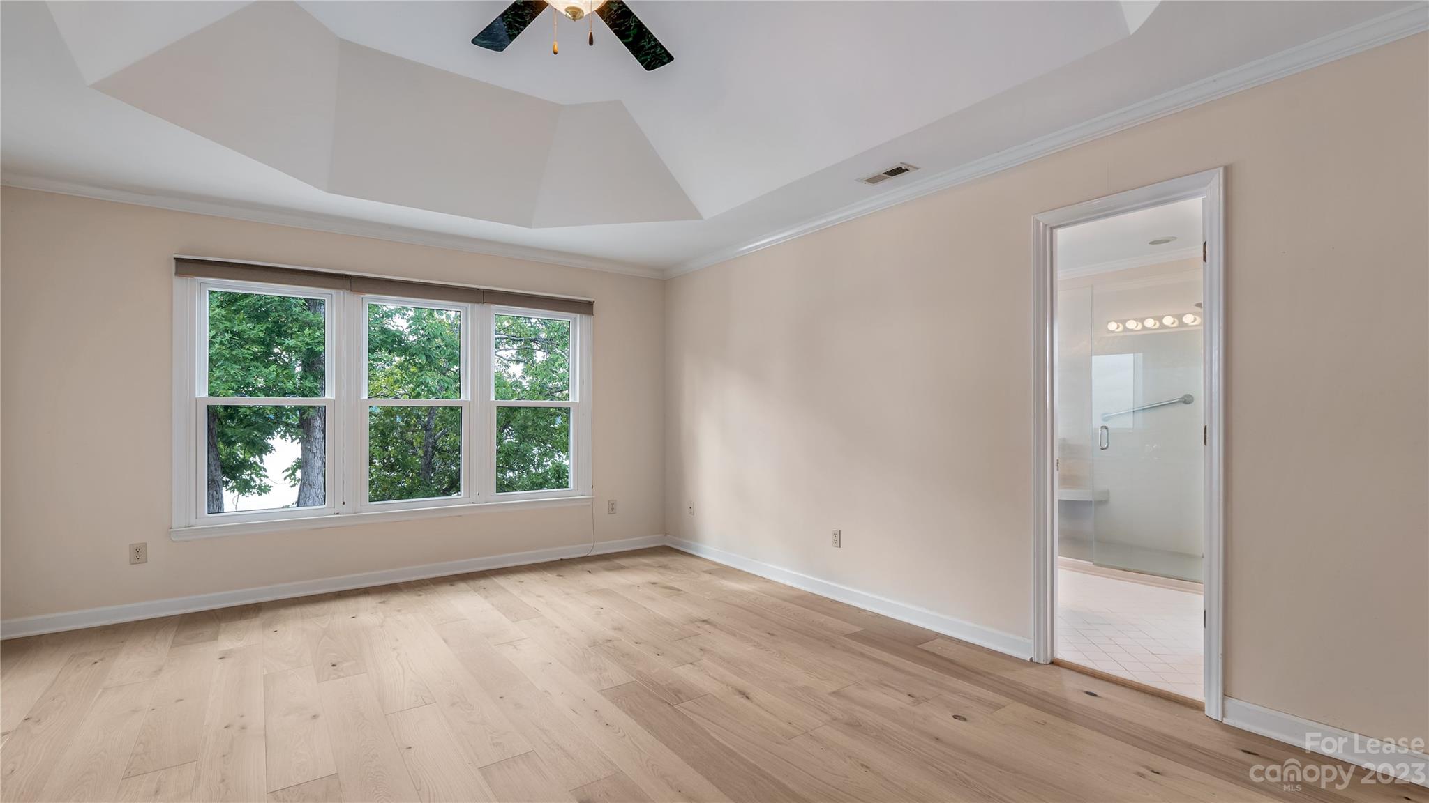 29025 Beaver Run Tega Cay, SC 29708 - Photo 19 of 40 wooden floor in an empty room with a window