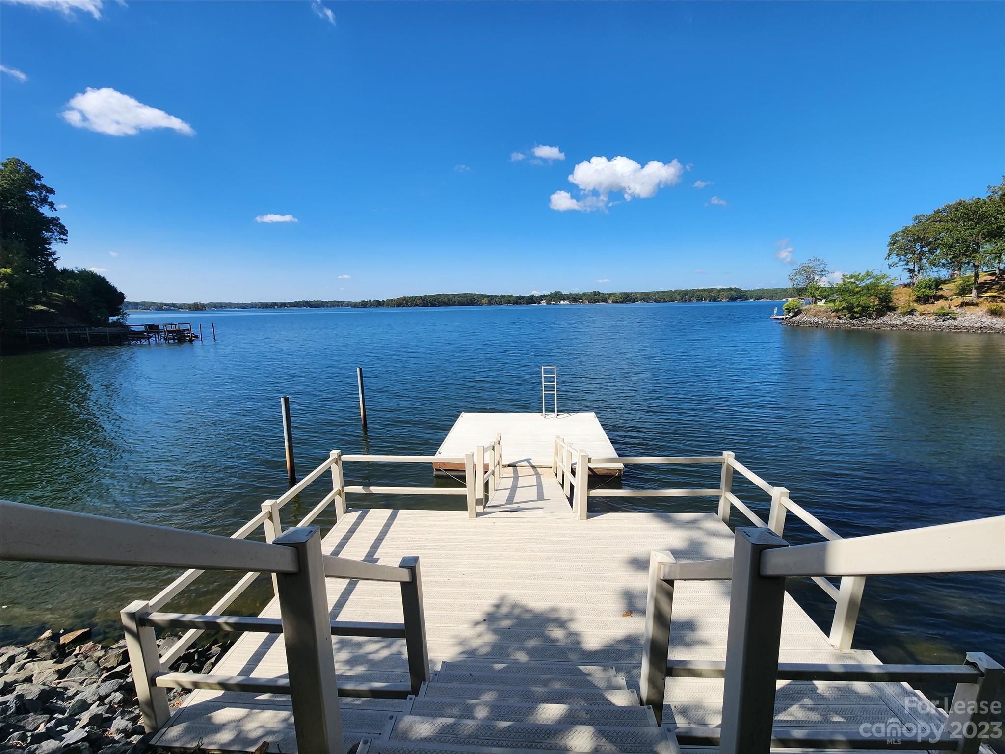 29025 Beaver Run Tega Cay, SC 29708 - Photo 2 of 40 a terrace of a house with outdoor seating
