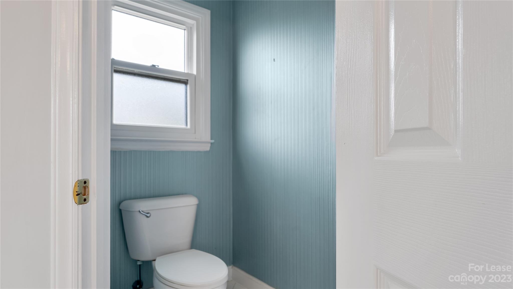 29025 Beaver Run Tega Cay, SC 29708 - Photo 22 of 40 a white toilet sitting next to a window