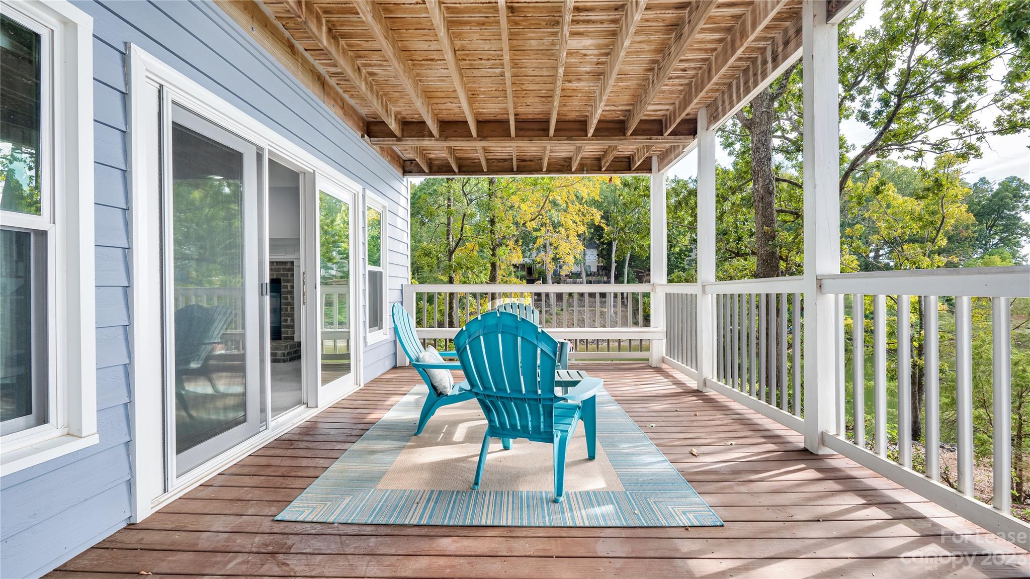 29025 Beaver Run Tega Cay, SC 29708 - Photo 33 of 40 a view of a chair and tables in the balcony