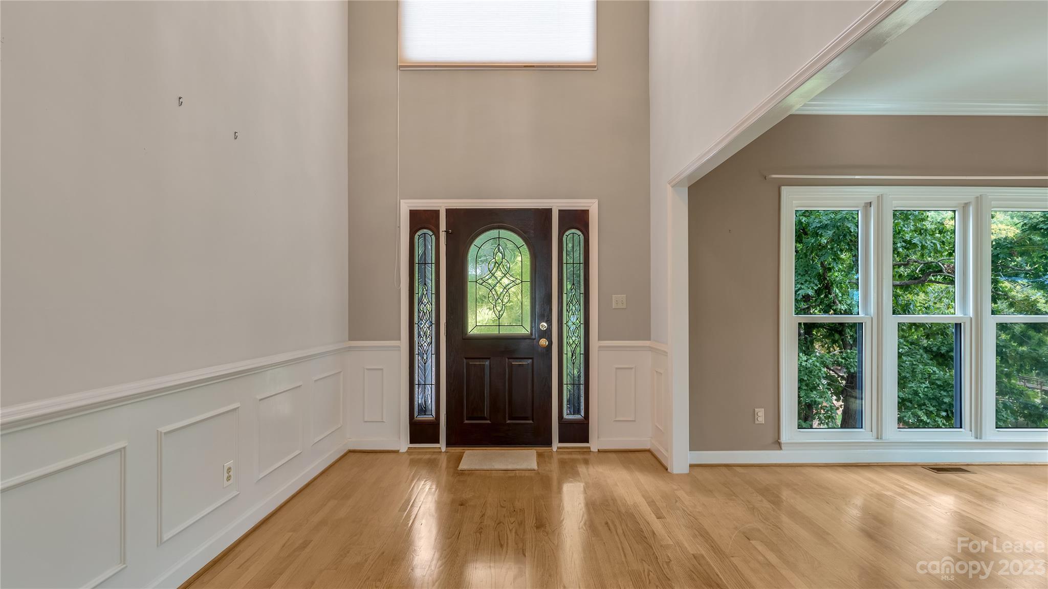 29025 Beaver Run Tega Cay, SC 29708 - Photo 7 of 40 a view of an entryway with wooden floor