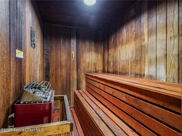 a view of room with window and furniture
