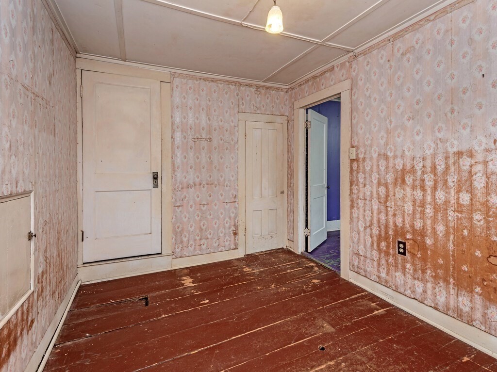 194 Wales Road Brimfield, MA 01010 - Photo 24 of 42 a view of a room with wooden floor and a shower